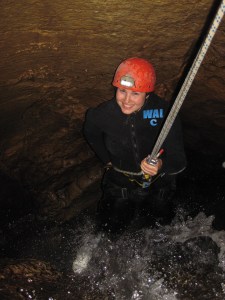 Abseiling in a cave