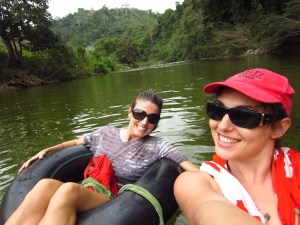 In relax mode after passing the scary rapids. In the distance behind us are the family of 6 who left us in their rippling wake.
